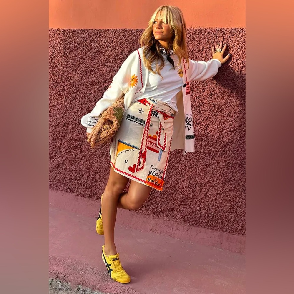 Never Fully Dressed Cream Graphic Wrap Skirt with Red & Yellow Accents